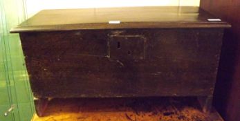 An 18th Century and later small Oak Board Coffer on stile feet, 30” wide