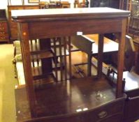 A late 18th/early 19th Century Mahogany Fold Top Tea Table, folding and swivelling top raised on