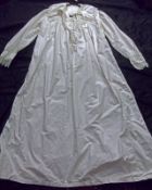 A late 19th Century White Cotton Ladies Nightgown, pin-tucked pleats to front, large collar edged