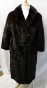 A mid-20th Century Dark Brown ¾ length Ladies Mink Fur Coat, double breasted style with decorative