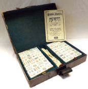 A Vintage Mah-Jongg Set in original case; together with instruction booklet published by Jaques &