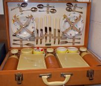 A mid-20th Century Brexton Picnic Hamper, complete with contents, to include three Thermos Flasks,