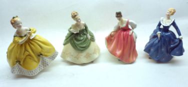 A group of four Royal Doulton Figurines: “Fragrance”, HN2334; “Soiree”, HN2312; “Fair Lady”,