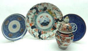 A Japanese Imari small Covered Vase, (rim chip to cover); two further Blue and White Saucer Dishes