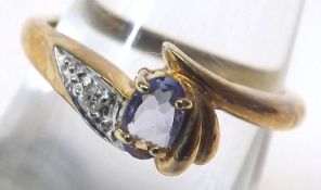 A hallmarked 9ct Gold Ring set with a Tanzanite and Diamond