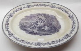 A large 19th Century Oval Meat Plate, the centre decorated with a scene of Phiz by H K Browne, 22”