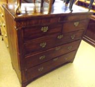 A 19th Century Mahogany Chest, fitted with two shallow frieze drawers over two short and three