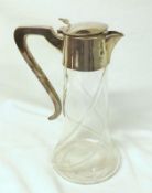 An early 20th Century Clear Glass and Jug with Silver Plated top and handle, 10” high