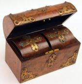 A Victorian Walnut Dome Topped Tea Caddy, applied with gilt metal strapwork, interior fitted with