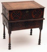 An 18th/19th Century and later Oak Bible Box on Stand, the later carved top and front with moulded