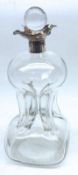 An unusual Clear Glass Dimple Decanter on square base, fitted with flared silver collar and stopper,