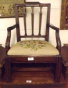 A small early 19th Century Mahogany Child’s Carver Chair with three slat back, push-out tapestry