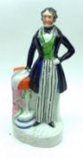 A 19th Century Staffordshire Figure titled “T J Duncan”, decorated throughout in colours, raised