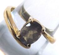 A hallmarked 9ct Gold Ring set with a Labradorite solitaire stone