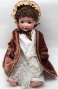 Heubach Koppelsdorf Bisque Socket Head Doll, Mould NO 320.3 Germany, with weighted blue sleep