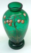 A late 19th Century Turquoise Glass Vase, decorated with a painted design of foliage, 6 ½” high
