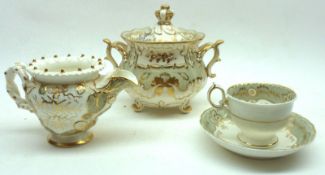 A 19th Century Rockingham style double-handled Sugar Basin, decorated with gilt sprays on a pale