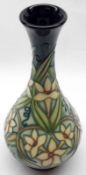 A Moorcroft Tapering Stem Vase, Carousel pattern, designed by Rachel Bishop, impressed marks to base