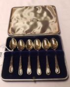 A cased set of six George V Coffee Spoons, in a fitted plush-lined case, Sheffield 1934, total