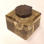 An Edwardian Square Glass Inkwell with chamfered edges and applied silver collar and lid (detached),