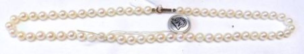 A cased set of ungraduated Mikimoto Cultured Pearls (Silver Seal), approximately 18cm long,