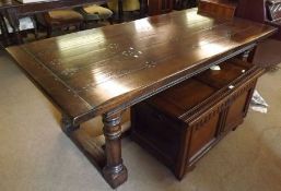 A 20th Century Oak Refectory Dining Table, raised on heavy turned legs with central “H” Stretcher,