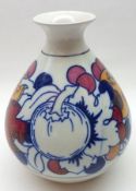 A Burleigh Ware Charlotte Rhead Squat narrow necked Vase with flared lip, decorated in blues, red