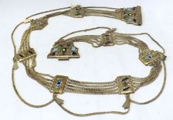 An Ethnic Gilded Metal and Enamelled Panelled Belt, 84cm long