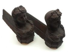 A pair of Cast Iron Fire Dogs, the fronts modelled as young female busts, 14” long