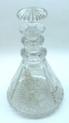 A 20th Century Lead Crystal Ships Decanter with facetted double knopped neck and domed facetted