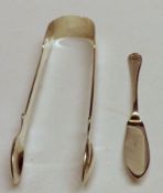 A pair of George III Sugar Tongs, Fiddle pattern, London 1808, Maker GW; together with a small