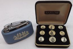 A Wedgwood Jasperware Table Lighter; together with a reproduction set of Scrimshaw type Buttons,