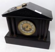 A late 19th/early 20th Century Black Marble Mantel Clock, of colonnade form, arched top over a
