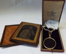 A Victorian Leather Cased Tinted Photograph of a young gentleman seated, 4” x 3” overall (case