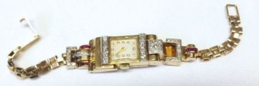 A Ladies Vintage yellow metal cased Cocktail Watch, set with small Brilliant Cut Diamonds and