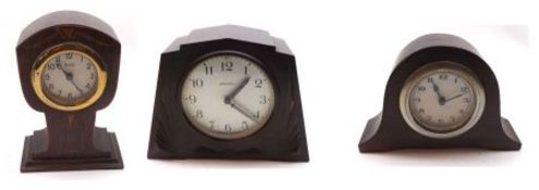 A collection of three early 20th Century Mantel Clocks, comprises a Bakelite cased Ingersoll