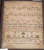 A Framed Needlework Sampler, decorated with rows of text, numbers and religious verse, signed Ann