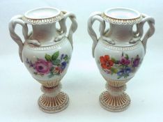 A pair of 20th Century Meissen Vases with double entwined snake handles, decorated with floral