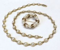 A hallmarked 9ct Gold all Cultured Pearl-set Line Design Necklace, 42cm long; together with a