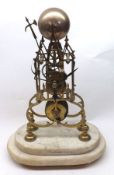 A late 19th/early 20th Century Brass Skeleton Clock, single chain movement with strike on a gong,