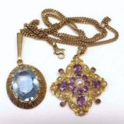 A hallmarked 9ct Gold Pendant in Victorian style, of quatrefoil design set with Amethysts and