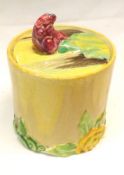 A Clarice Cliff “My Garden” Cylindrical Covered Preserve Pot with slotted lid, the body with Delicia