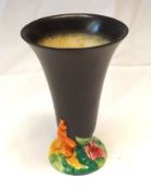 A Clarice Cliff “My Garden” Trumpet Vase, plain black body and coloured relief moulded floral
