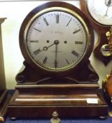 A Mahogany Cased Bracket Clock, circular face with gilt metal bezel, enamelled dial with black Roman