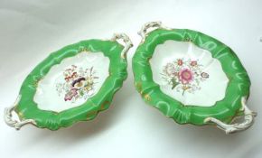 Two Wedgwood Pearl double-handled Dessert Pedestal Dishes, the centres painted with floral sprigs to
