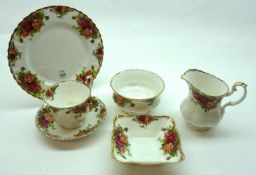 A quantity of Royal Albert Old Country Rose Tea and Table Wares, comprising six Dinner Plates, six