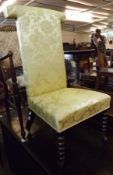 A 19th Century Prie Dieu Chair on bobbin turned front supports, upholstered in yellow floral