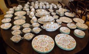 A large and extensive Minton Haddon Hall Tea, Coffee and Dinner Service, comprising three Covered