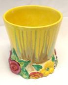A Clarice Cliff “My Garden” small Cylindrical Vase, the body decorated with ochre, yellow, brown and
