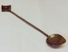 An African Mixed Metals Decorative Small Spoon with twist stem and enamelled finial, 6” long